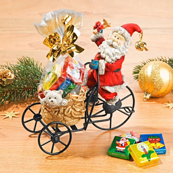 Figúrka Santa Claus na trojkolke + sladkosti