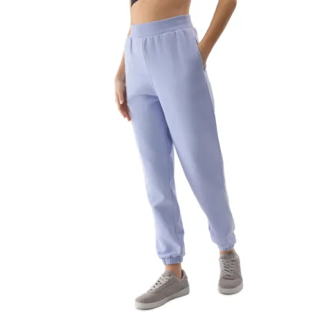 Dámske tepláky 4F TROUSERS-4FWSS24TTROF666-34S-LIGHT BLUE
