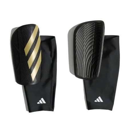 Futbalový chránič ADIDAS TIRO SG COM BLACK GOLDMT WHITE